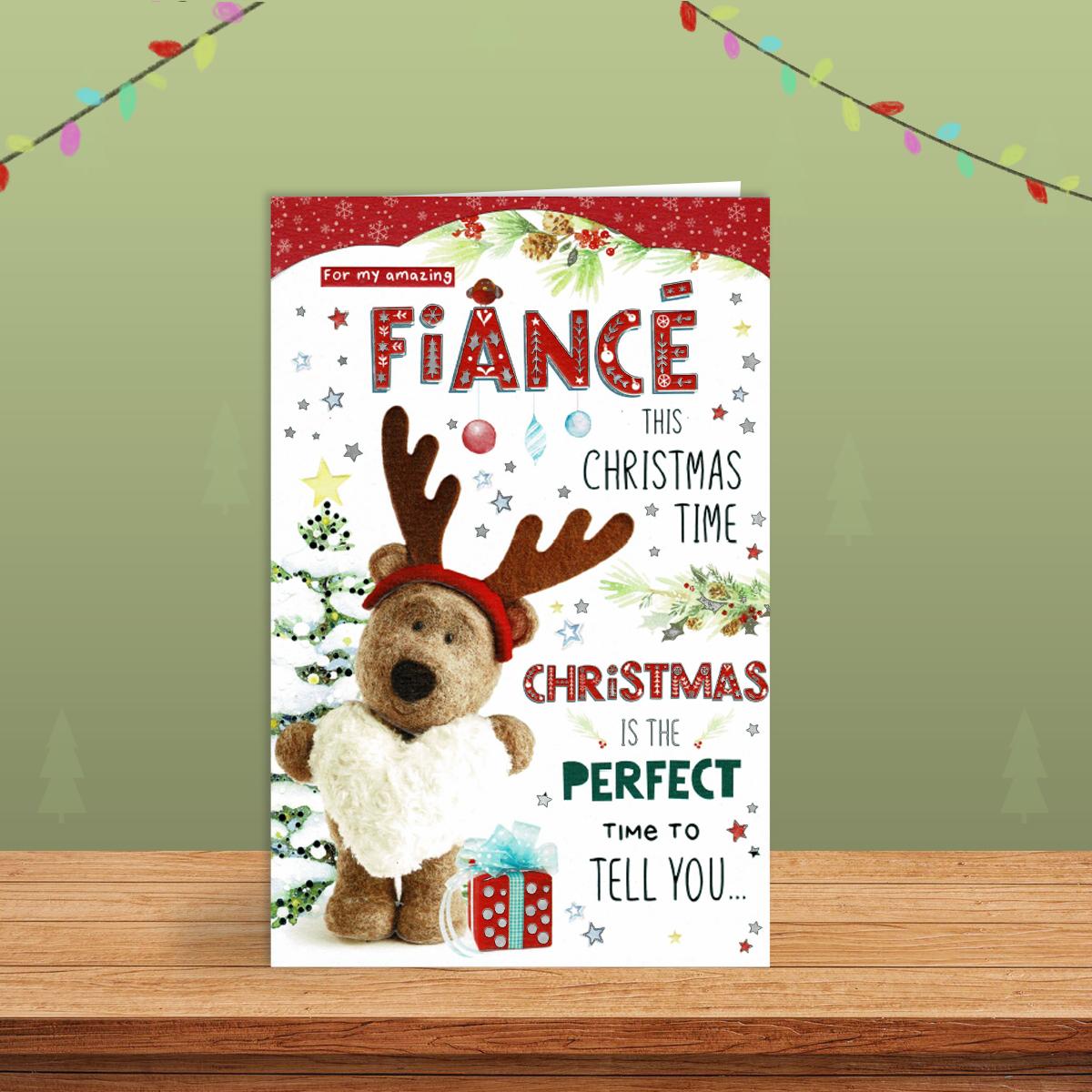Fiance Christmas Card Alongside Its Red Envelope