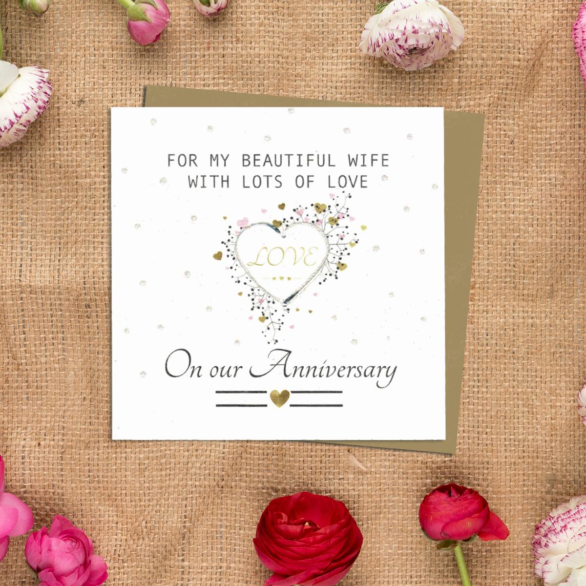 Wife Anniversary Card Alongside Its Kraft Envelope