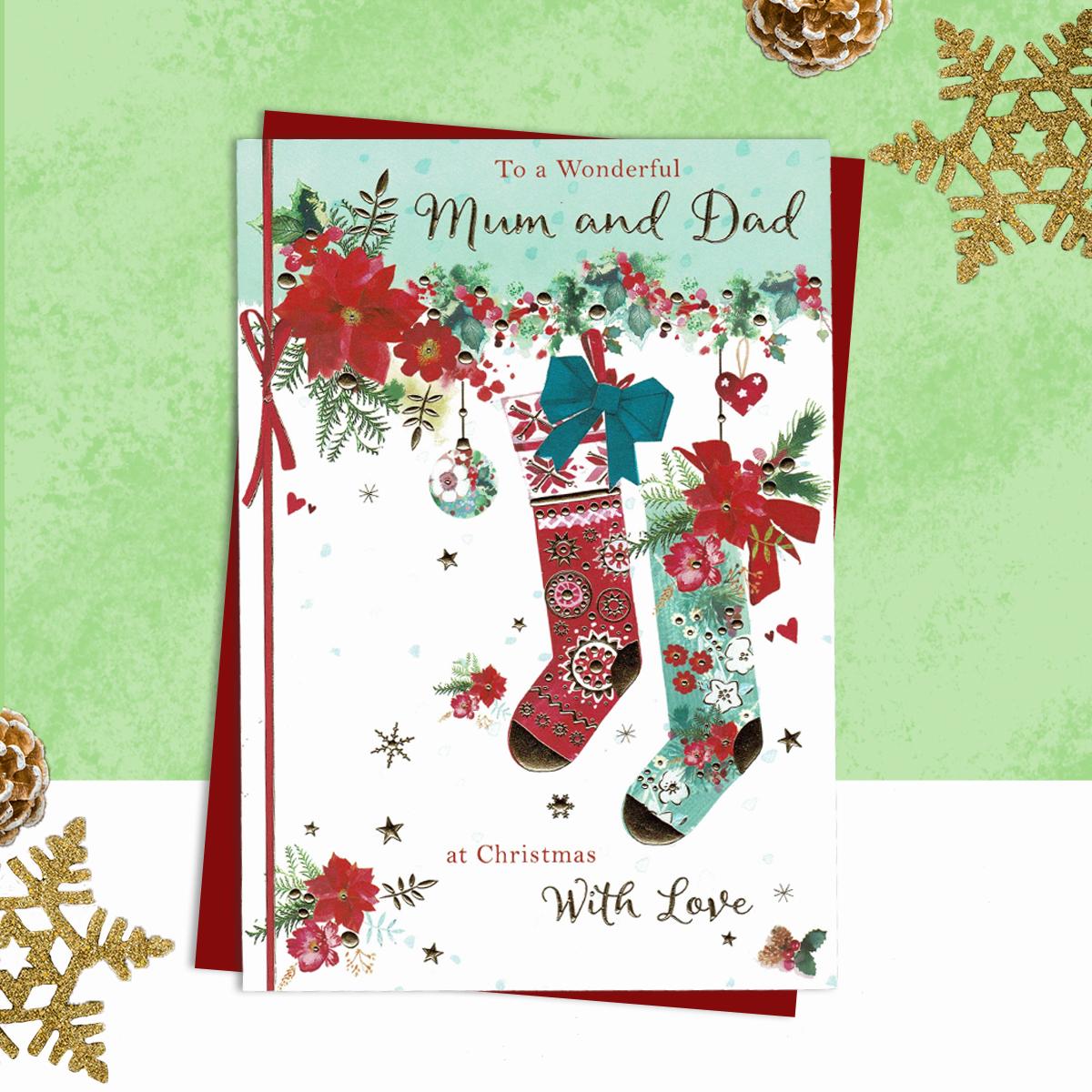 Mum And Dad Christmas Stockings Greeting Card Alongside Its Red Envelope