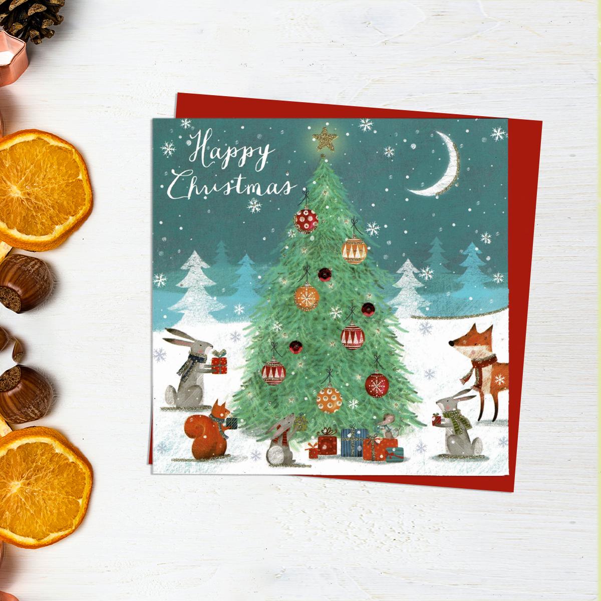 Happy Christmas Open Card Showing Tree And Woodland Animals. Added Sparkle For That Wow! Red Envelope