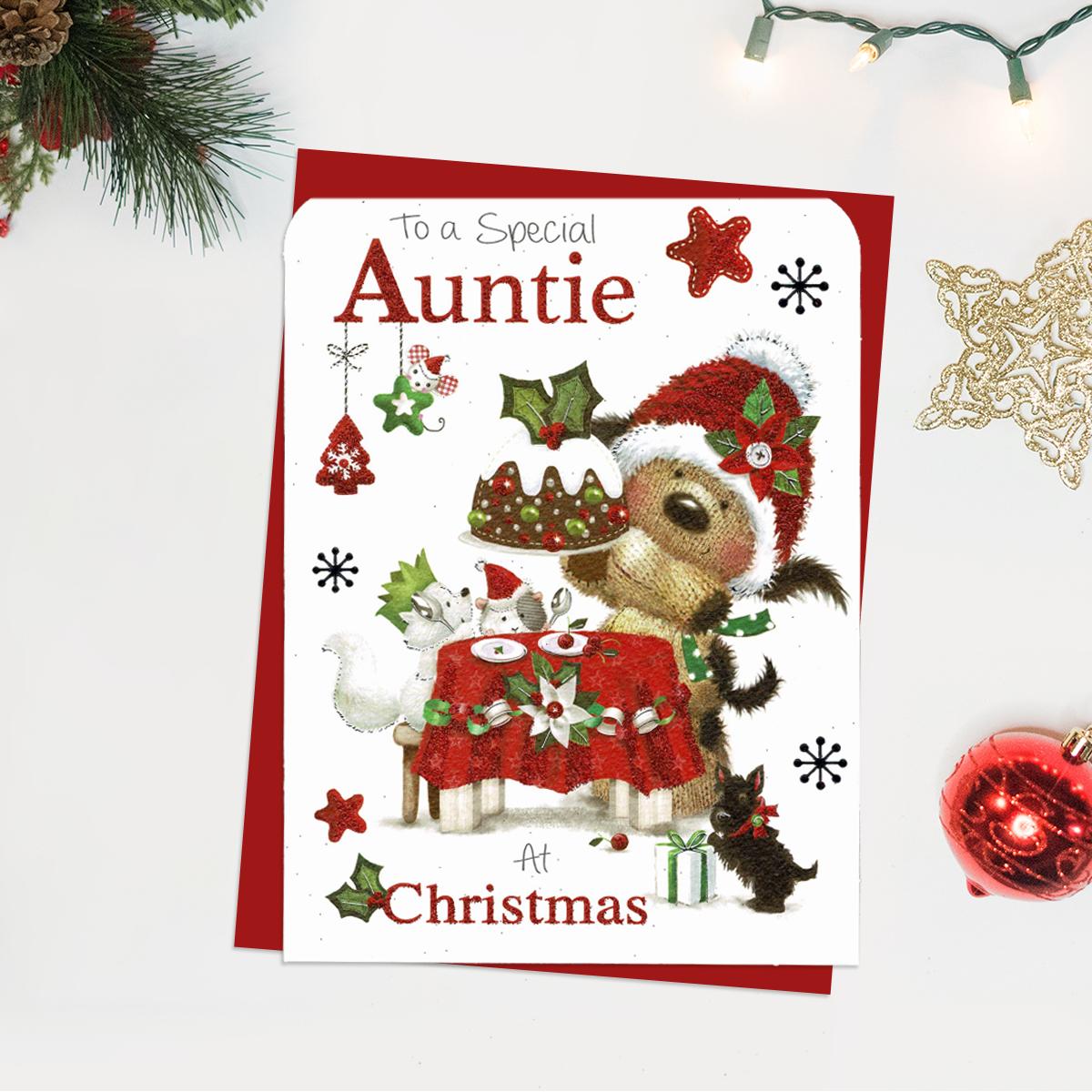 To A Special Auntie At Christmas Showing A Cute Dog And Animal Friends Around A Christmas Table. Finished With Red Glitter And Envelope
