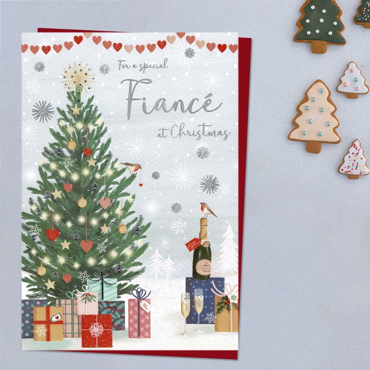 Fiance Christmas Card Displayed Alongside Its Red Envelope