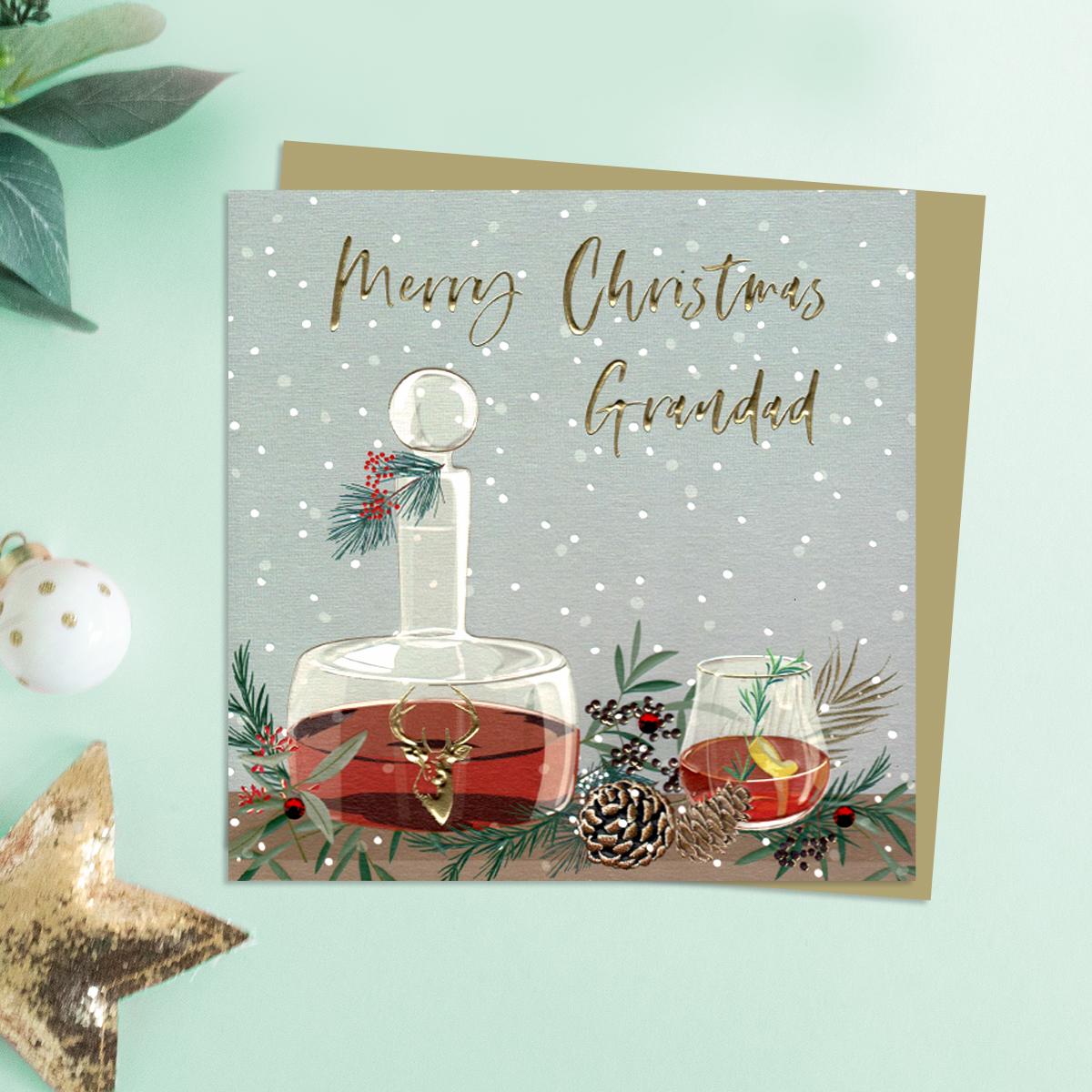 Grandad Decanter Christmas Card Alongside Its Gold Envelope