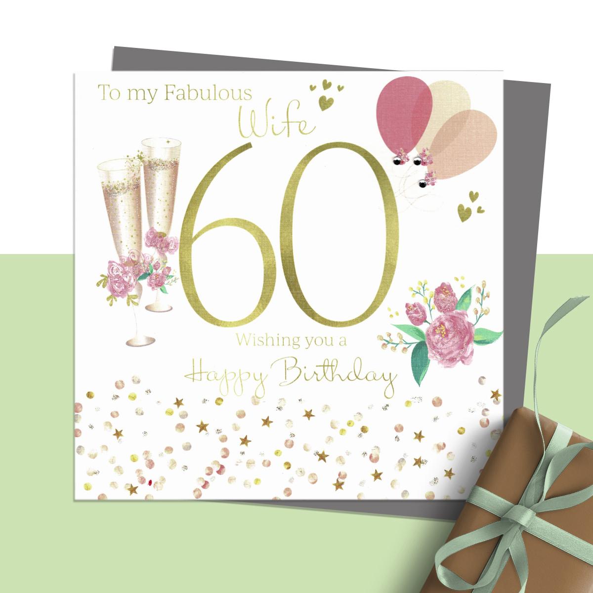 ' To My Fabulous Wife 60 Wishing You A Happy Birthday' Featuring Champagne Flutes, Flowers And Balloons. Hand Finished With Sparkle And Jewel Embellishments. Blank Inside For Own Message. Complete With Silver Coloured Envelope