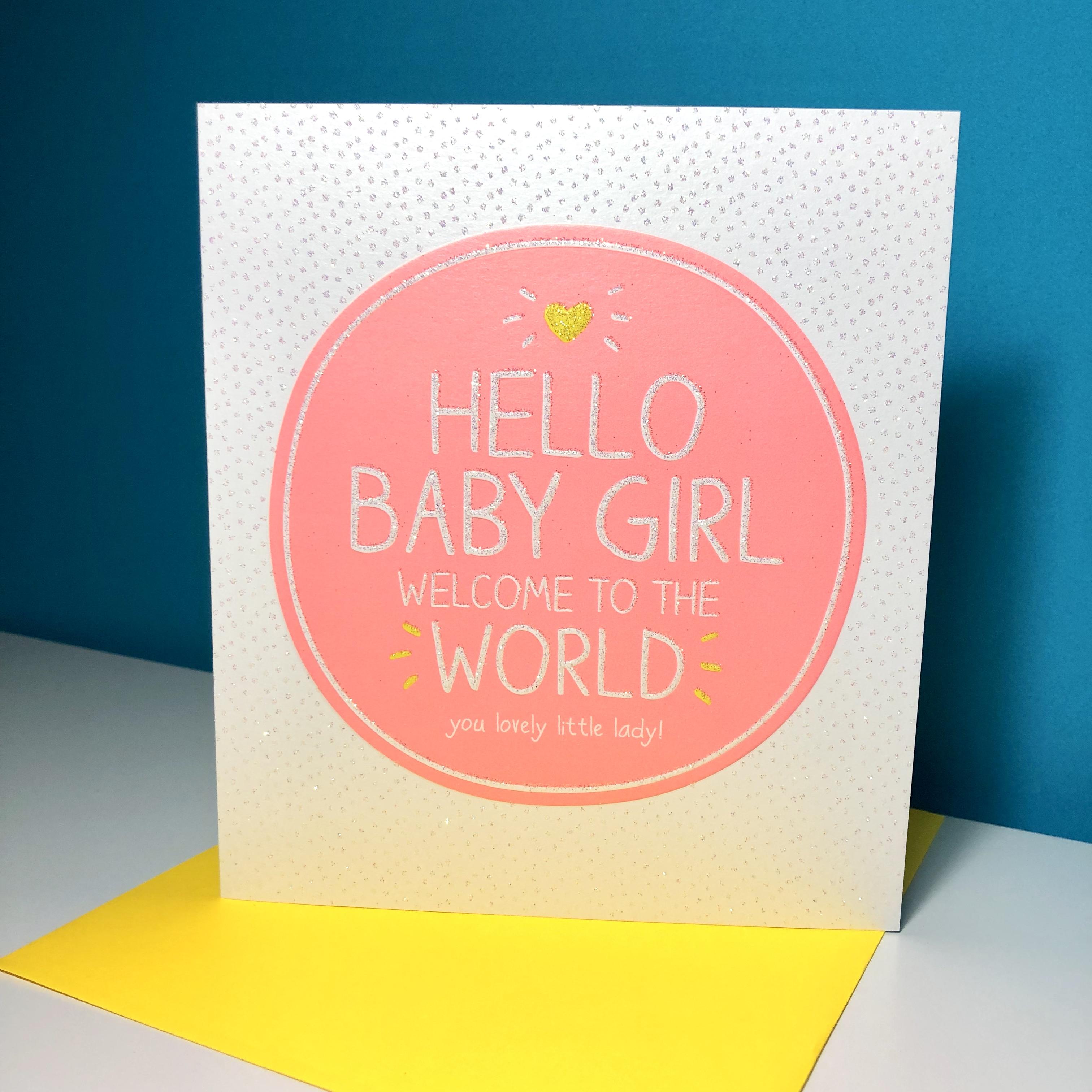 Baby Girl Birth Card Alongside Its Yellow Envelope