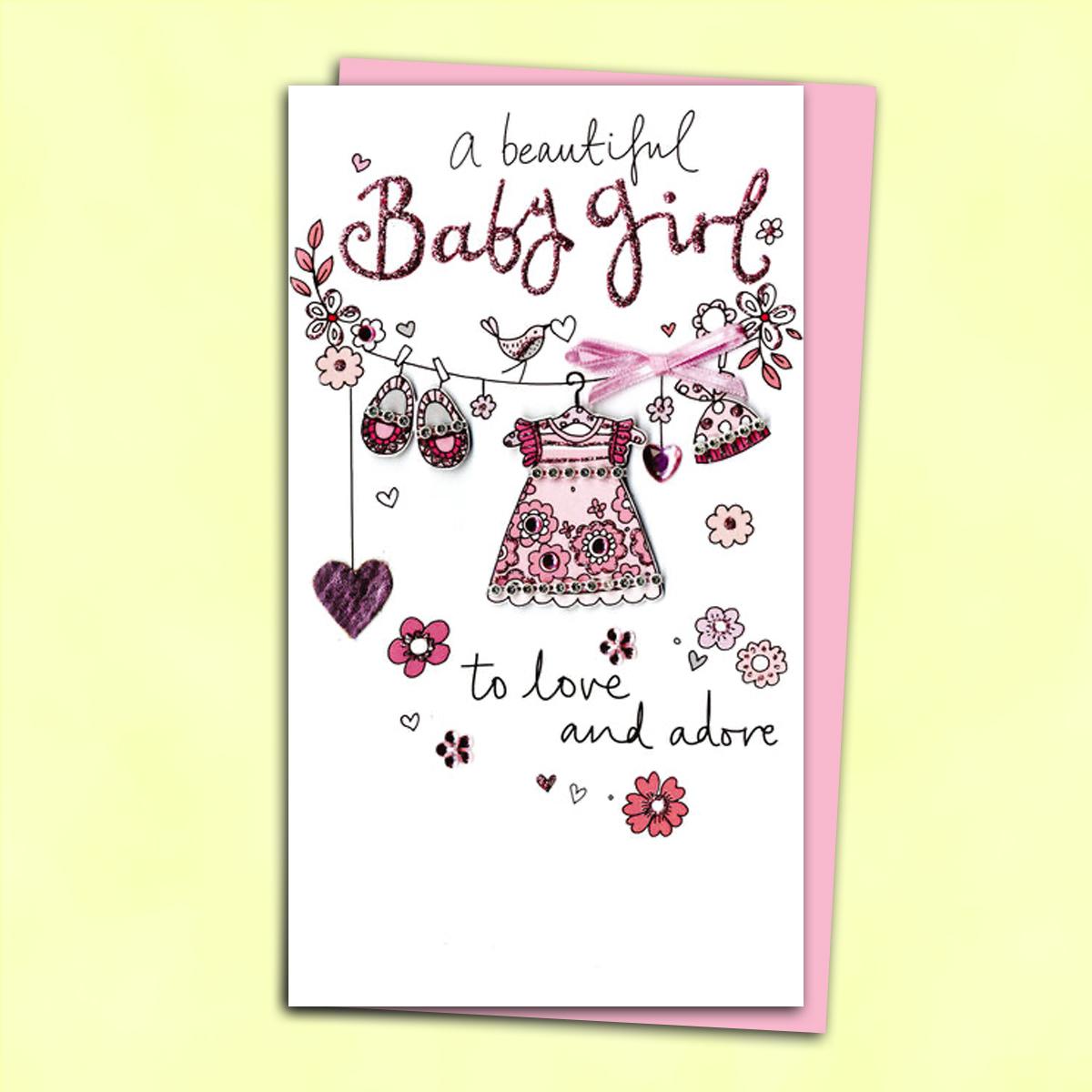 Baby Girl Congratulations Card Alongside Its Pink Envelope