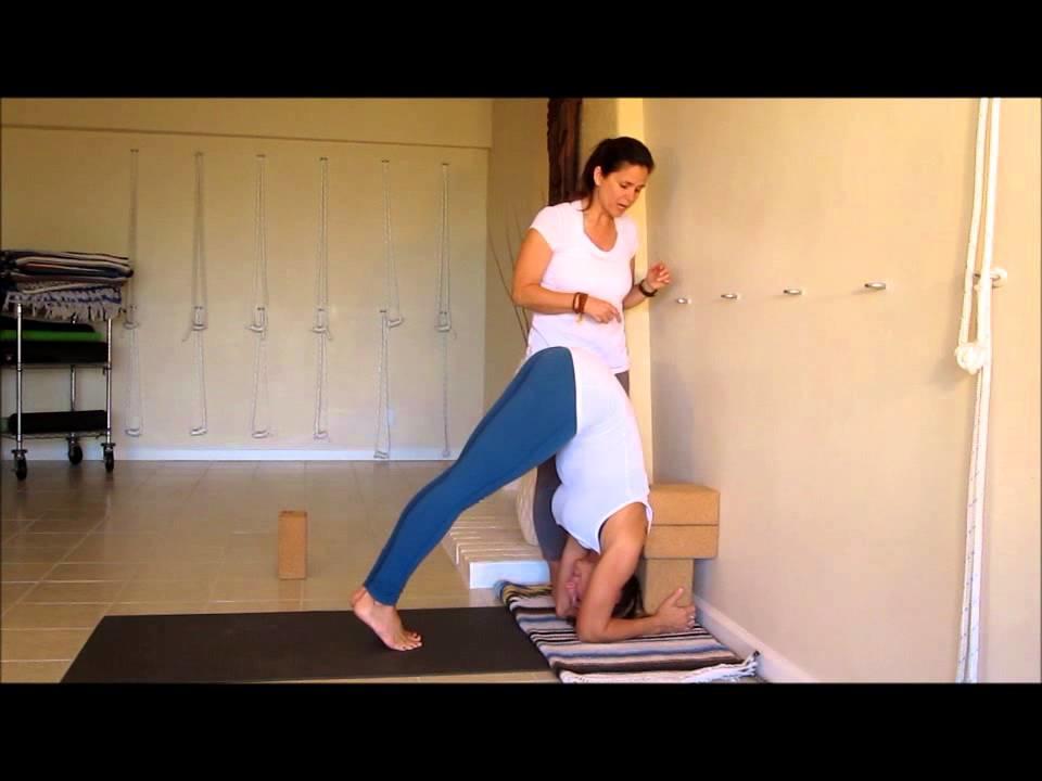 headstand with cork yoga blocks 