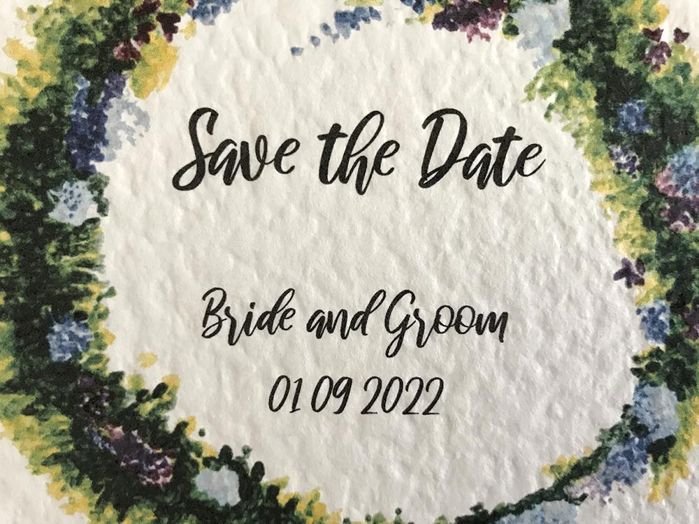 Save the date with painted flowers and modern typography