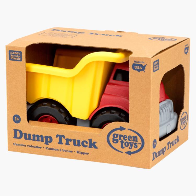 Yellow and red dump truck in manufacturer's packaging.