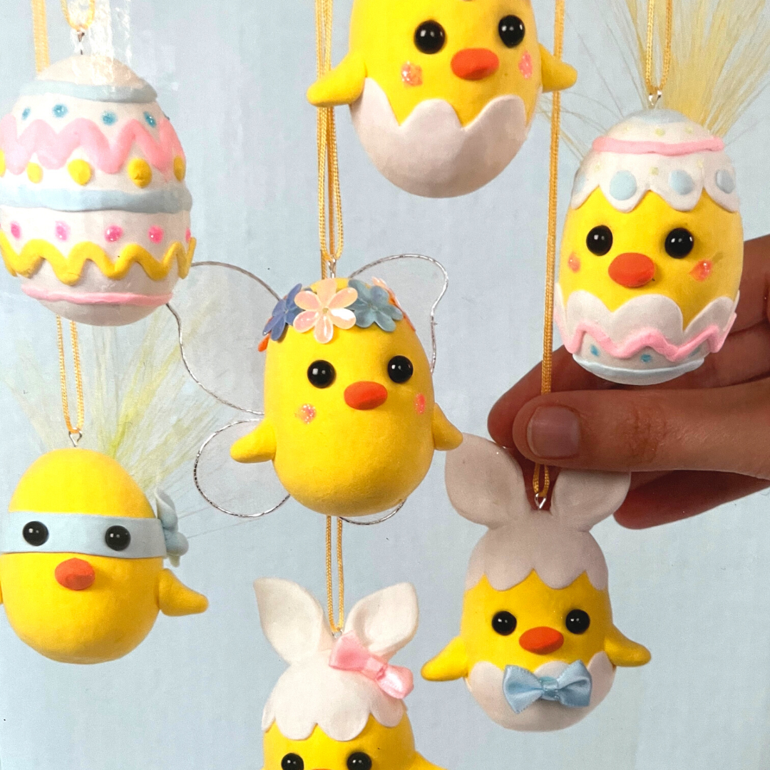 Close up of crafted Easter chicks on front of box.