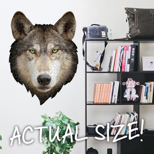 Large wolf head jigsaw on wall to show large scale.