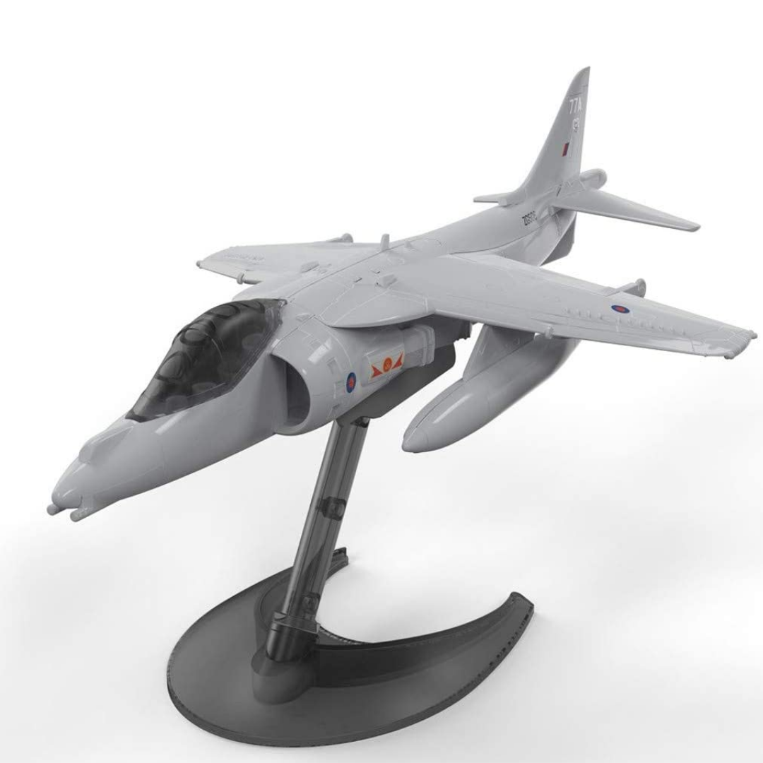 Model Harrier jet on black stand.
