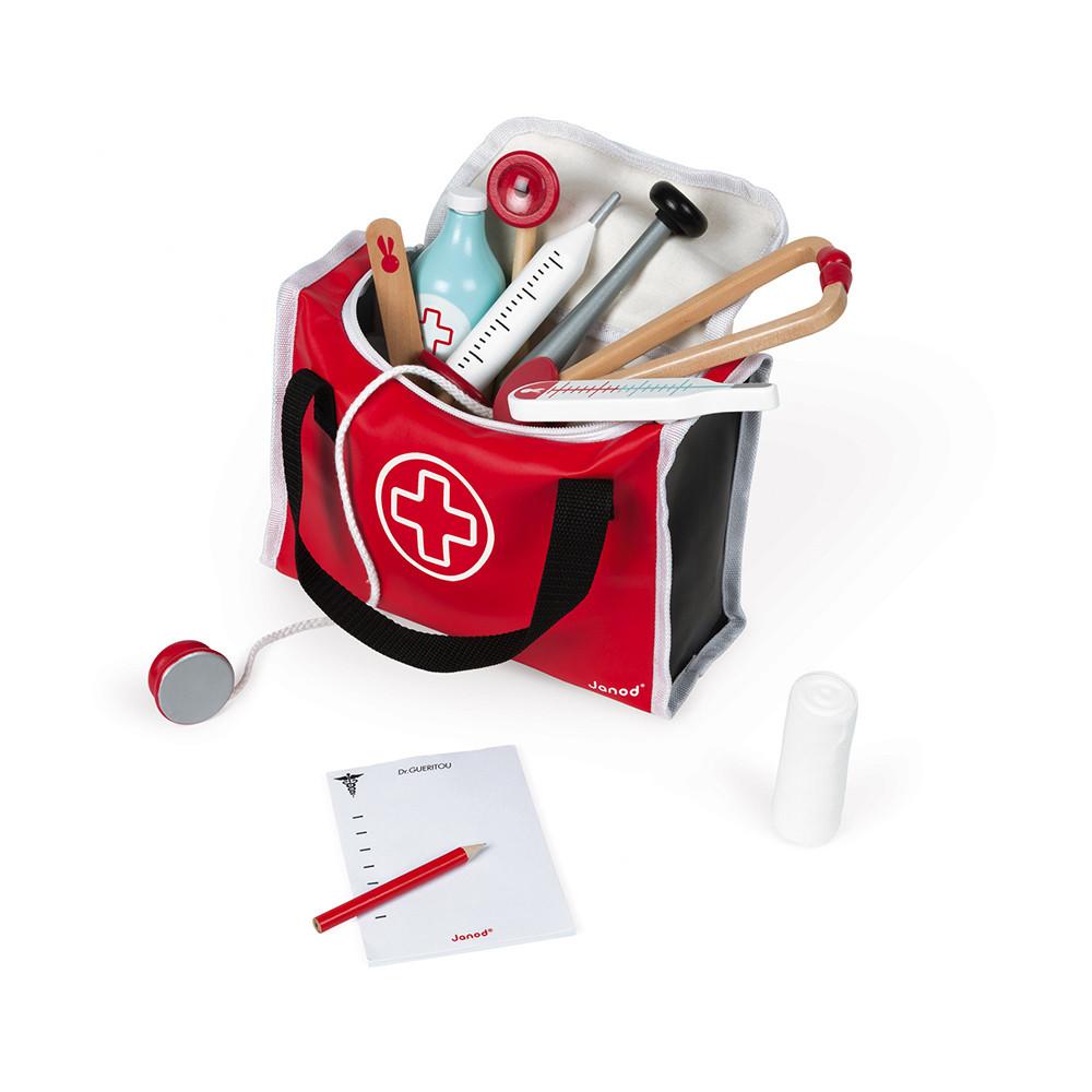 Children's play doctor's bag with wooden equipment sticking out.