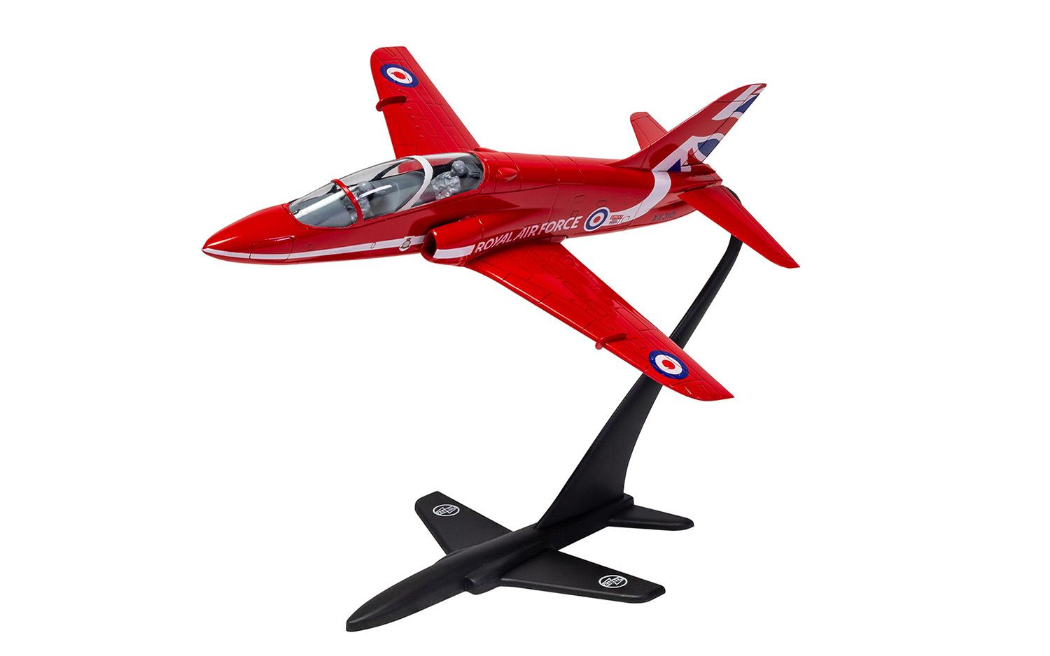 Side view of the red Red Arrows hawk jet model.