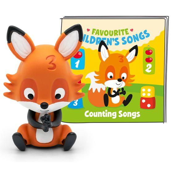 Orange fox sitting in front of greenish pack for Counting Songs Tonie.