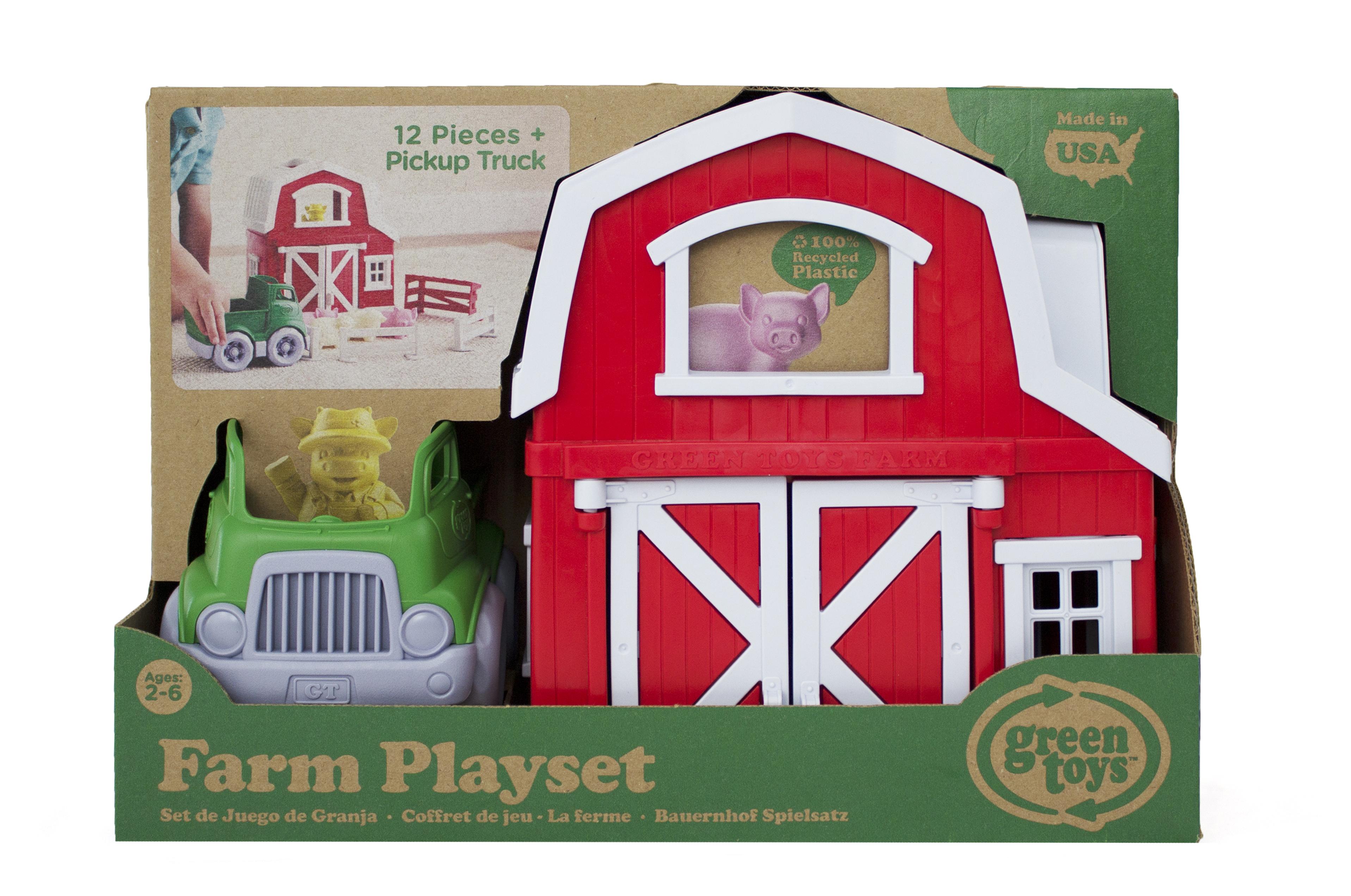 Red farmhouse play-set in manufacturer's packaging.