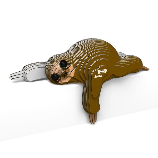 Sloth figure lying down with one paw reaching down over an edge.