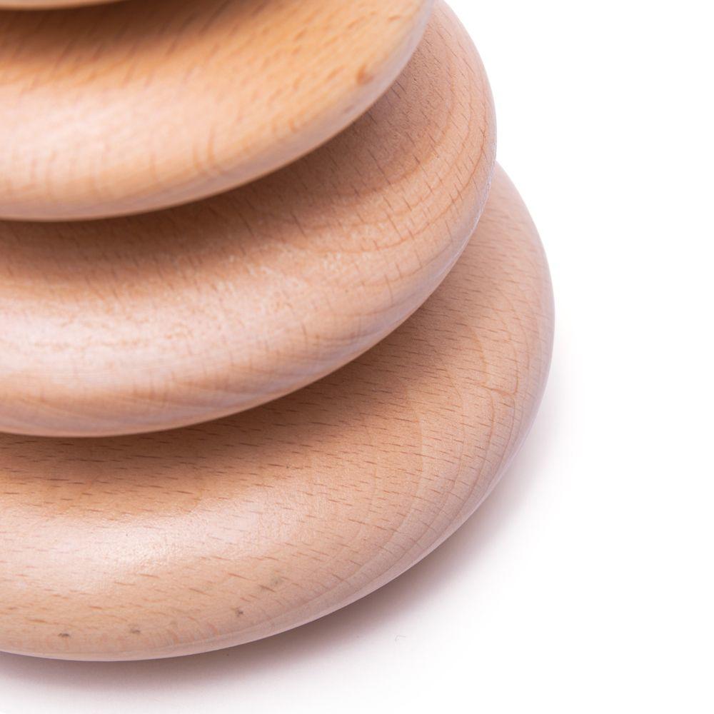 Close up of a section of the smooth stacking wooden pebbles.