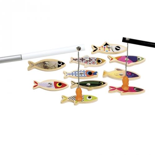 Toy fishing rods catching magnet fish-shaped pieces.
