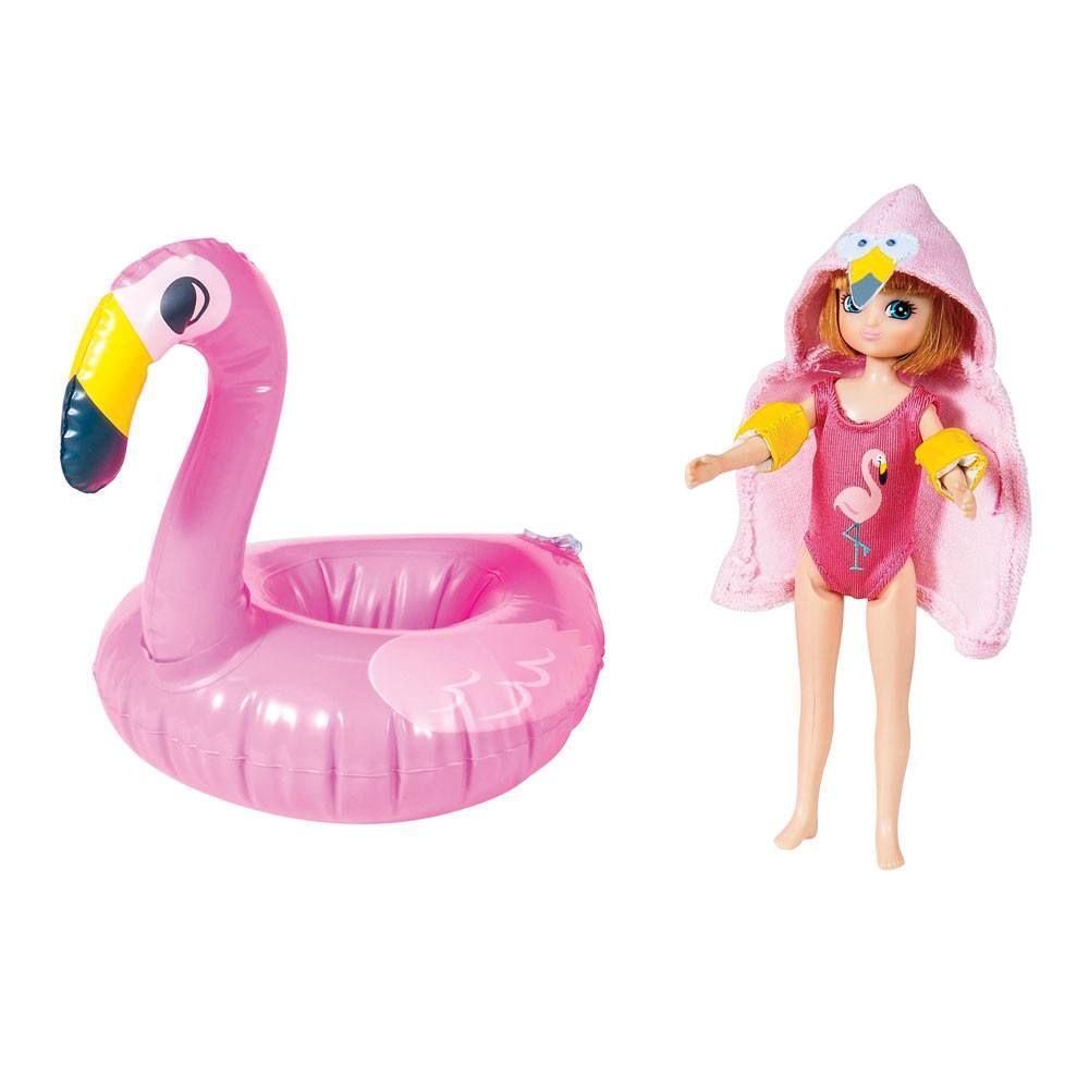 Lottie Doll in a pink swimming costume with a pink robe, armbands and a pink inflatable flamingo.