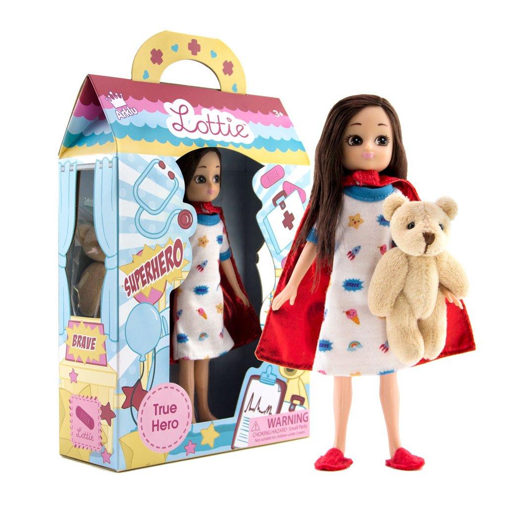 Lottie True Hero doll with manufacturer's packaging in the background.