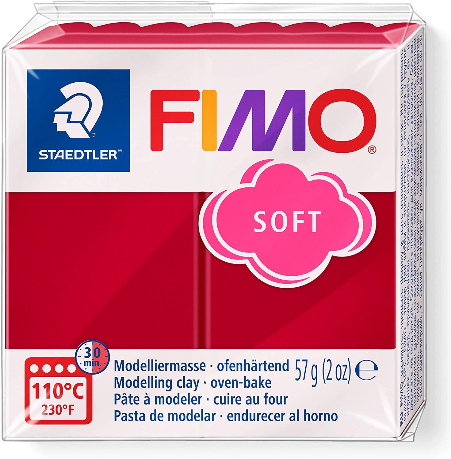 Fimo cherry red soft modelling clay in pack on white background.