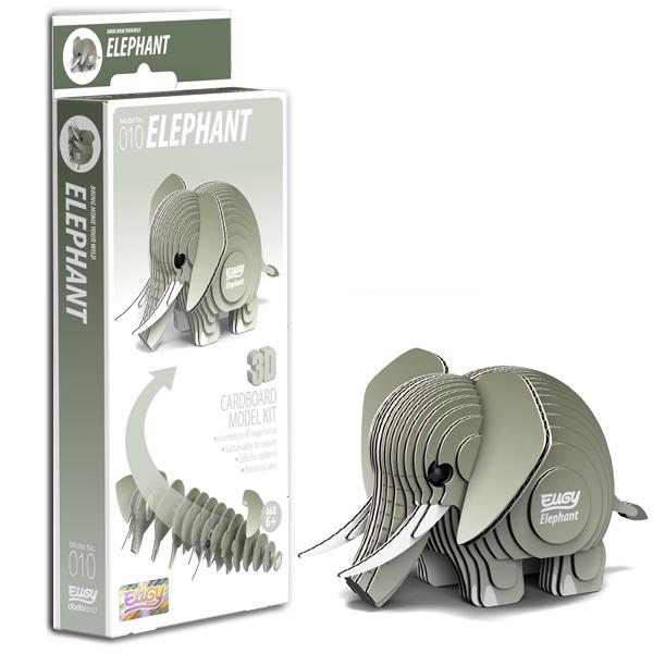 Greeny-grey elephant figure made from card pieces standing beside manufacturers' rectangular box.