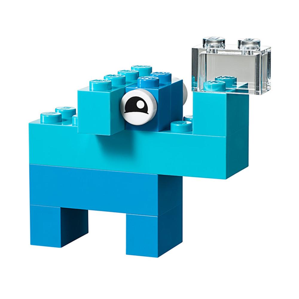 Two-tone blue elephant made up from Lego.