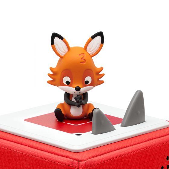 Orange fox Tonie sitting on top of a red Toniebox.