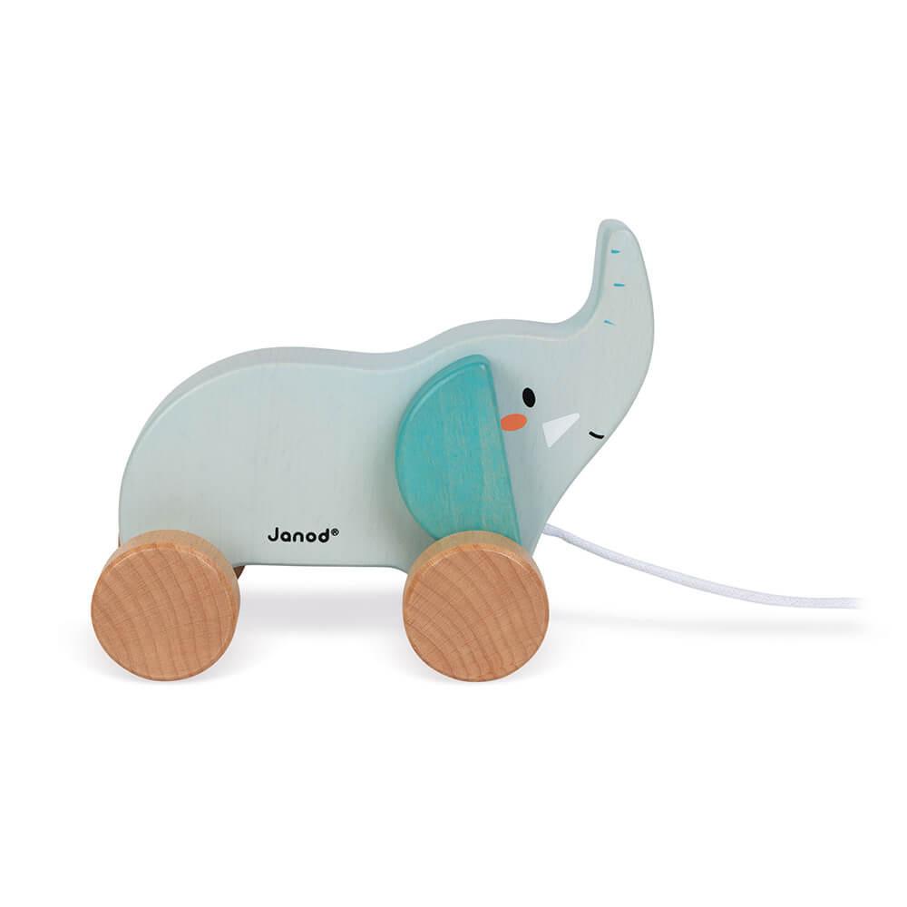 Pale blue wooden elephant with greenish blue wheels on a white packground