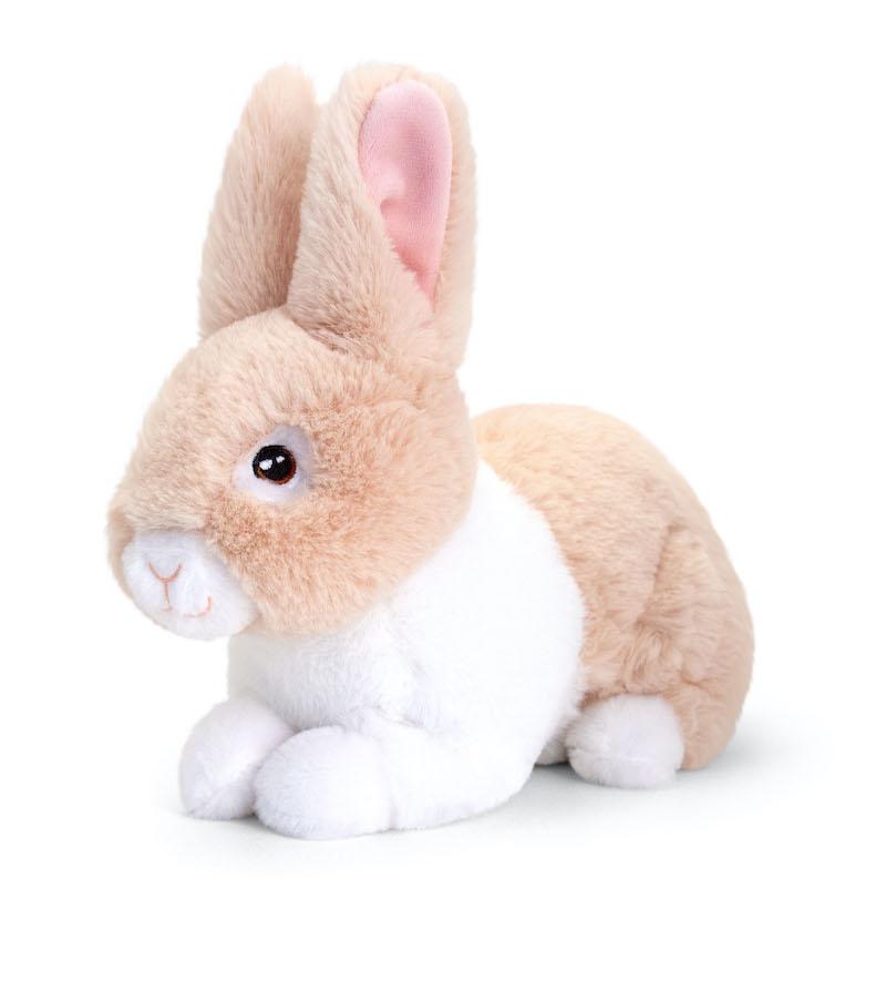 Cream and white crouching Easter cuddly bunny rabbit.