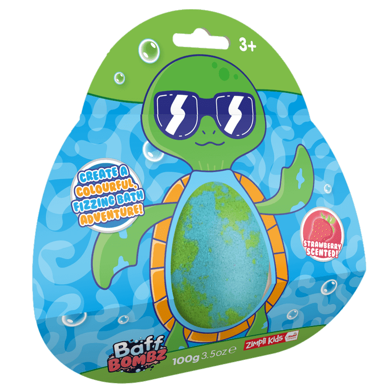 Green and blue egg-shaped bath bomb surrounded by turtle-shaped card packaging.