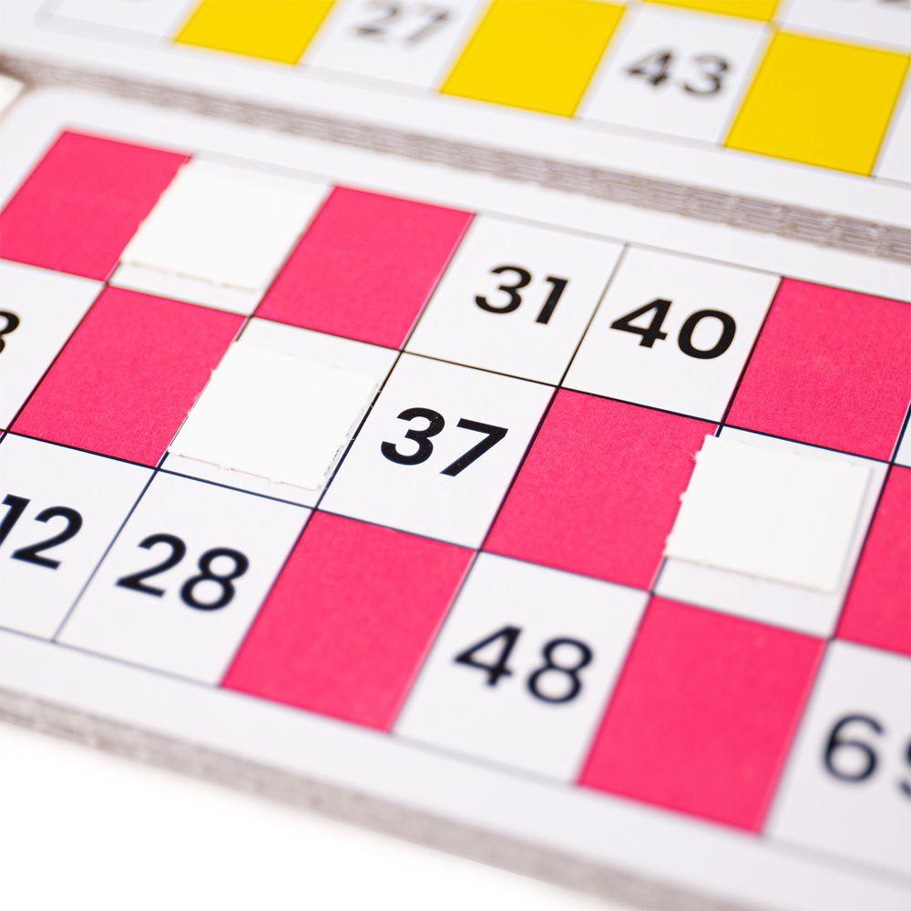 Close up of the pink and white chequered bingo card.