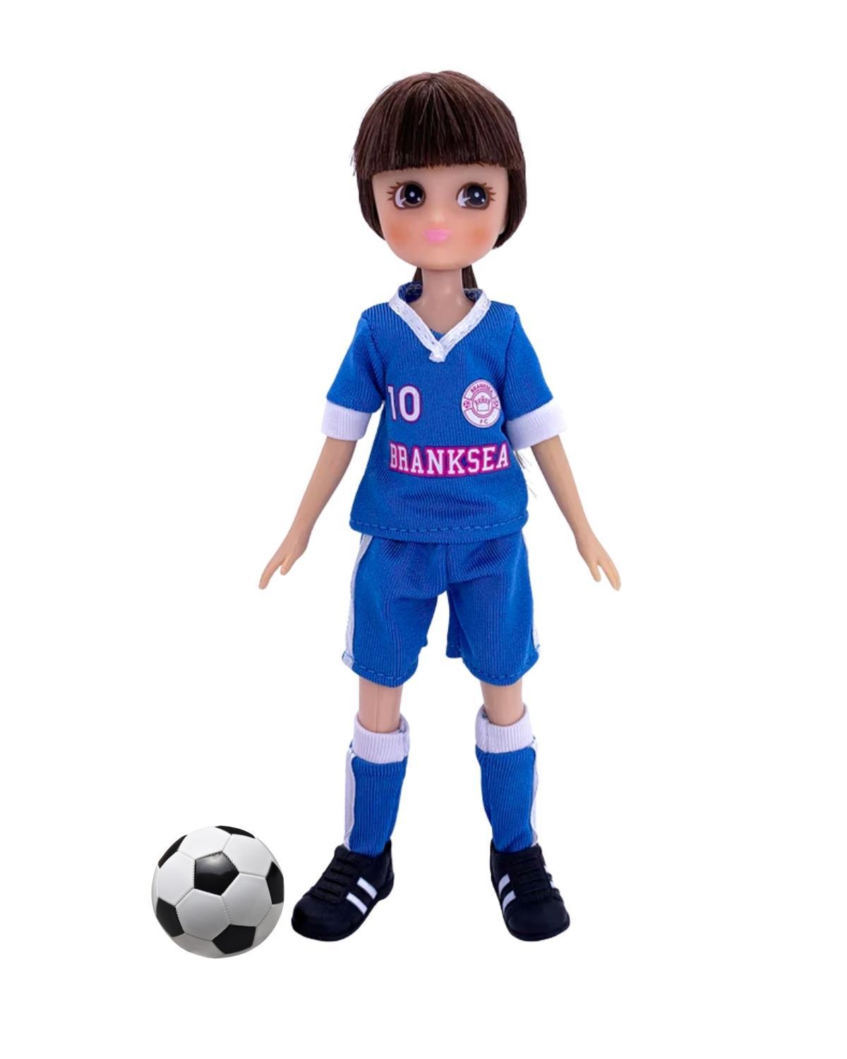 Lottie Doll wearing blue, red and white outfit.
