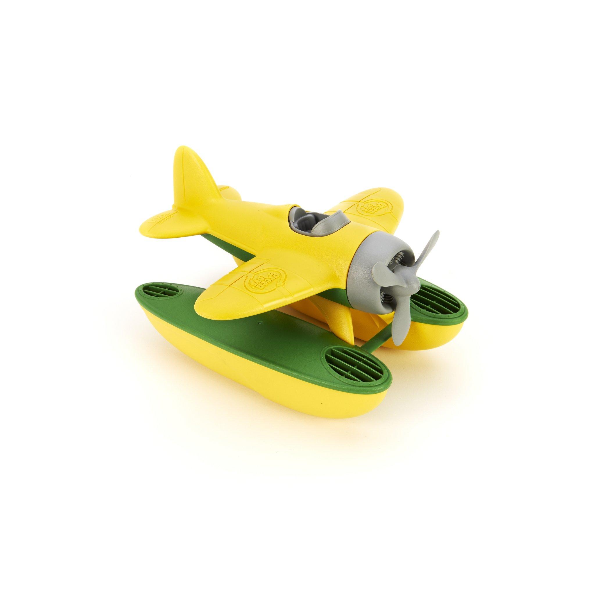 Yellow and green seaplane. White background.