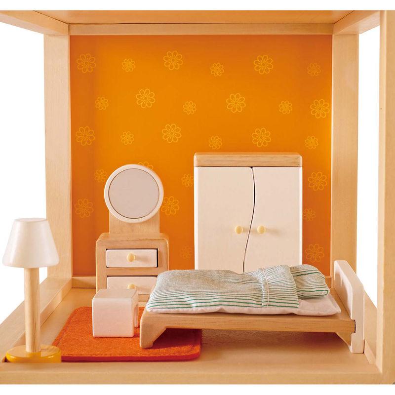 Hape master bedroom set up with bed, wardrobe, lamp, rug and dressing table