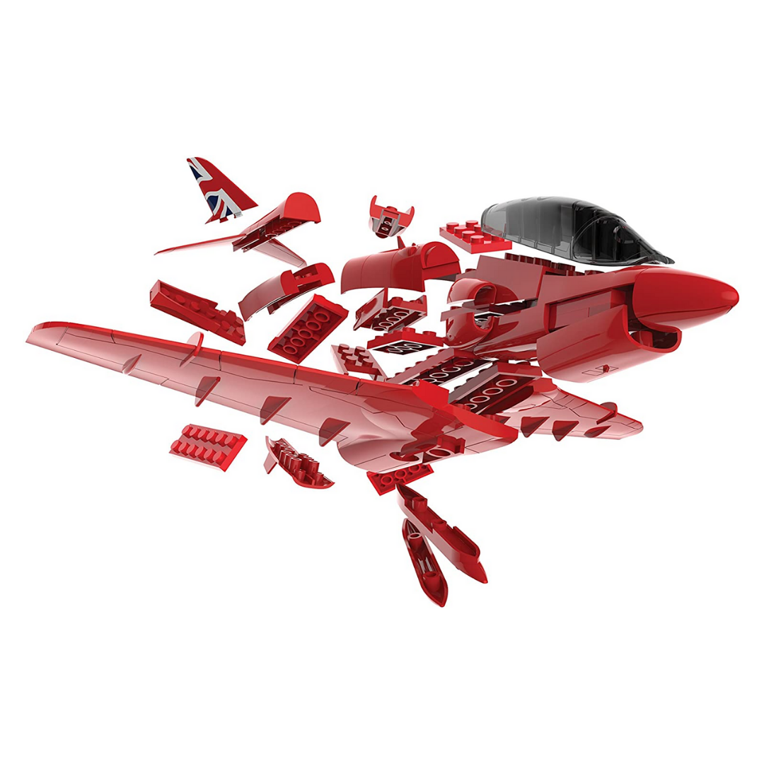 Pieces that make up a Red Arrows model jet. White background.