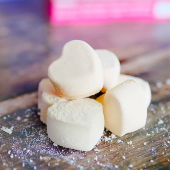 The complete cream-coloured, heart-shaped bath bombs.