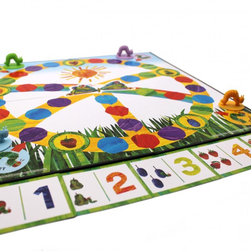 Colourful image showing a low perspective of the  Caterpillar board game with numbers and the caterpillar pieces on top.