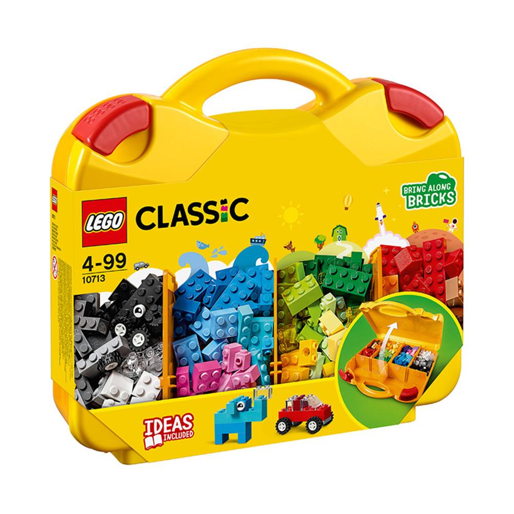 Yellow lego suitcase with a handle.