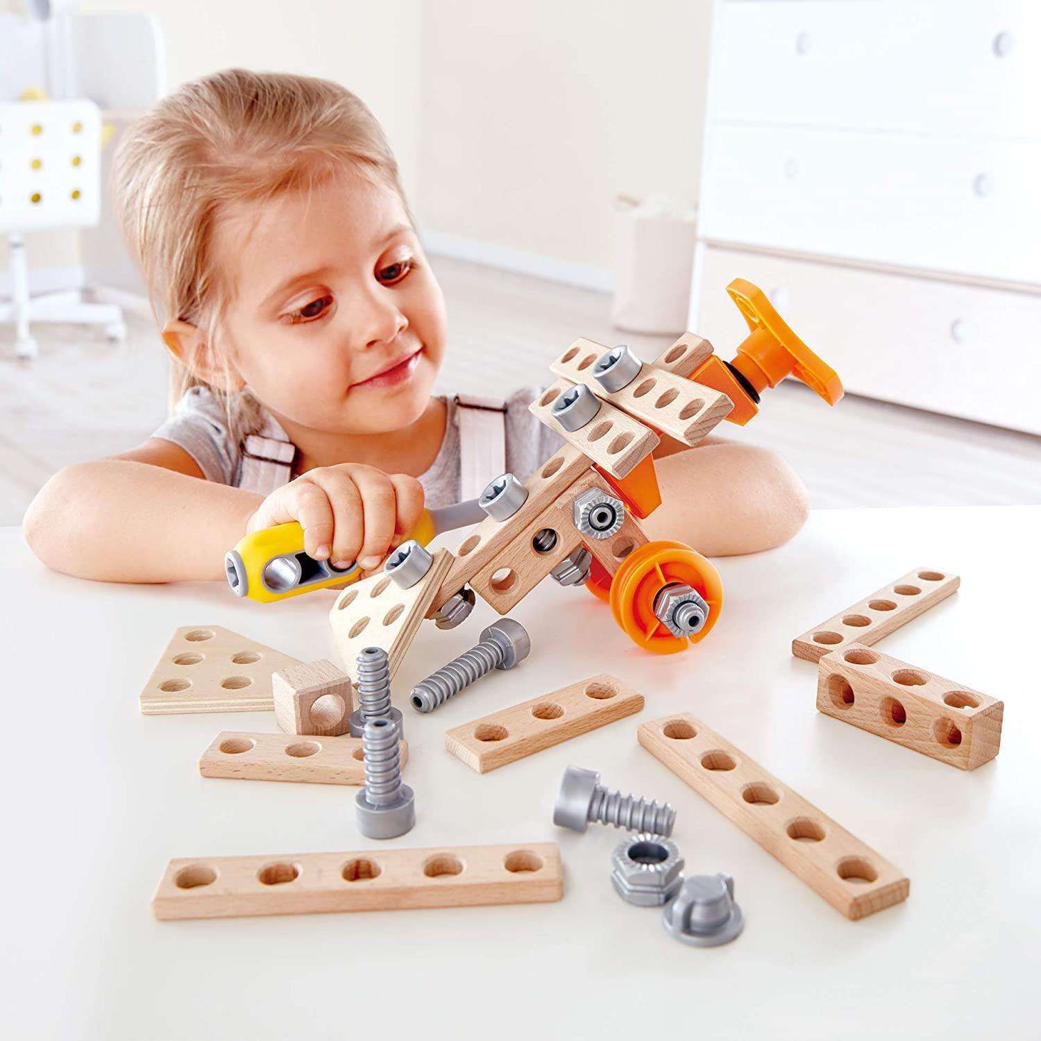 Young child playing with Junior Inventor kit