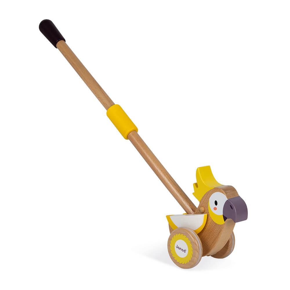 Wooden cockatoo with wheels and retractable pole. White background.