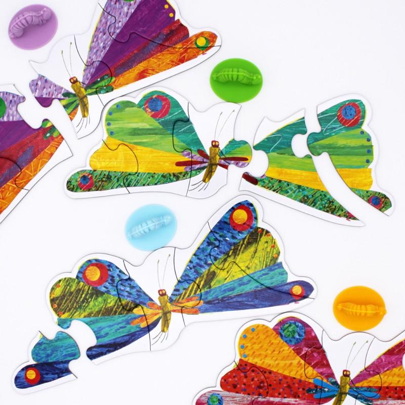 Butterfly jigsaw-type pieces that form part of the Hungry Caterpillar board game.