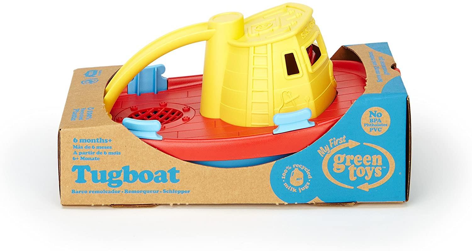 Green Toys tug boat toy in manufacturer's packaging.