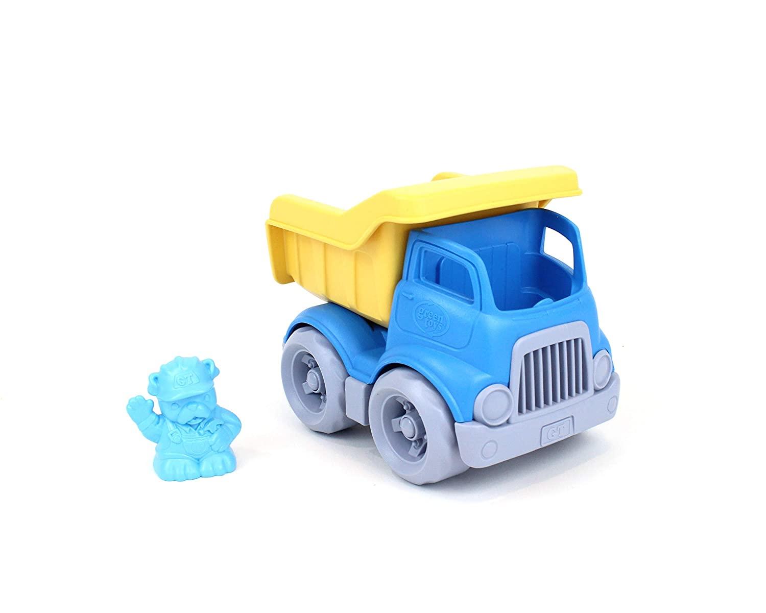 Blue and yellow eco-plastic dumper truck with removable blue fugure standing beside.