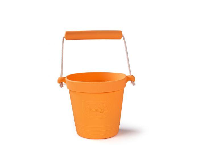 Orange silicone play bucket.
