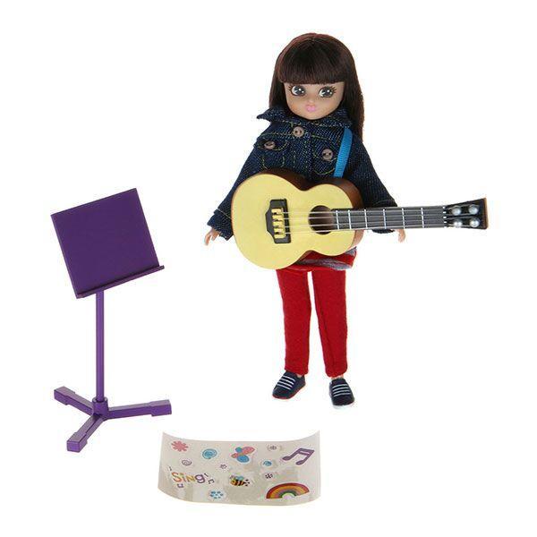 Music Class Lottie Doll with long dark hair with a guitar and music stand.