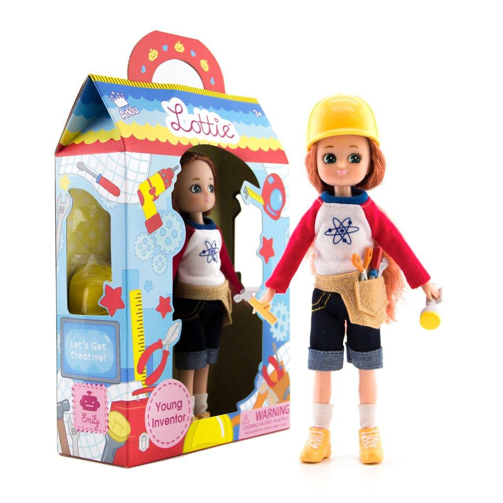 Lottie Young Inventor Doll with tools in her tool belt and wearing a yellow hard hat with packaging in the background.