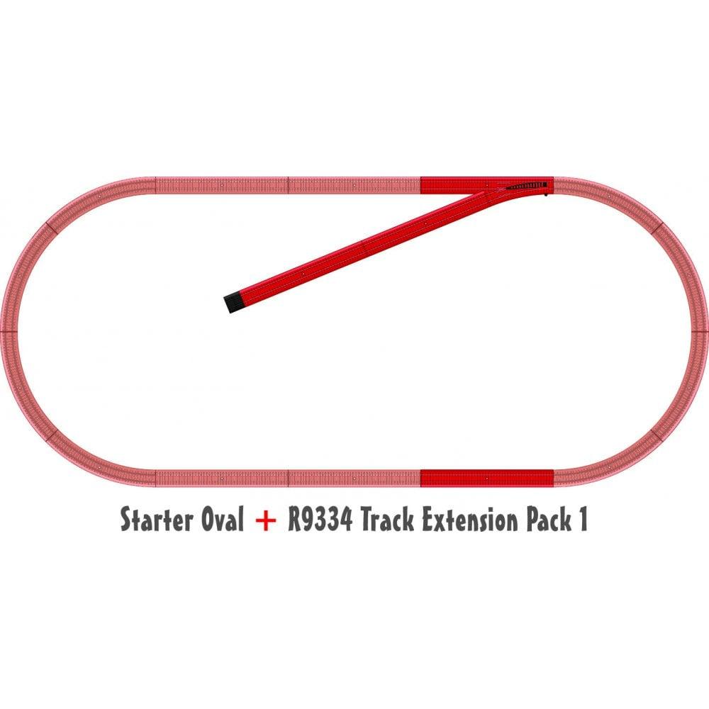 Illustration of a red, oval toy rail track with the extension pack pieces showing in a darker red.