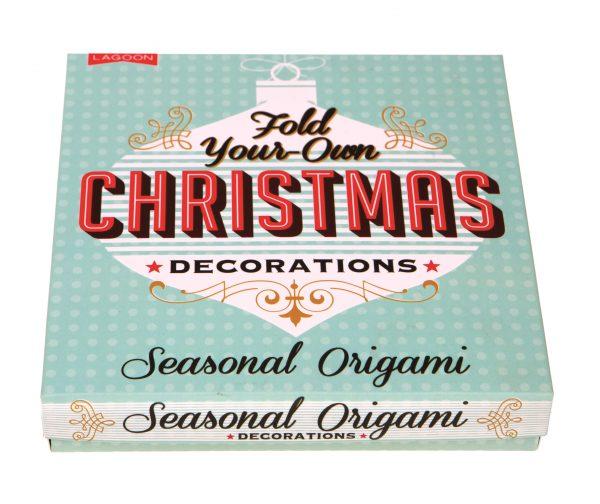 Pale blue-green square box with black and red text reading: "Fold Your Own Christmas Decorations' and the 'Seasonal Origami' at the bottom."